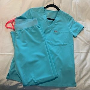 Figs scrubs neon blue